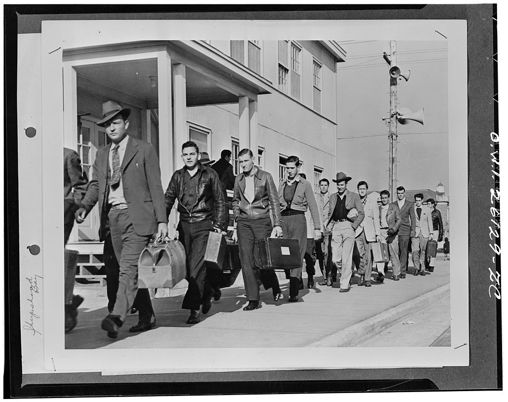 New recruits from all parts of the country shown arriving at the United States Maritime Service training station in Sheepshead Bay. 