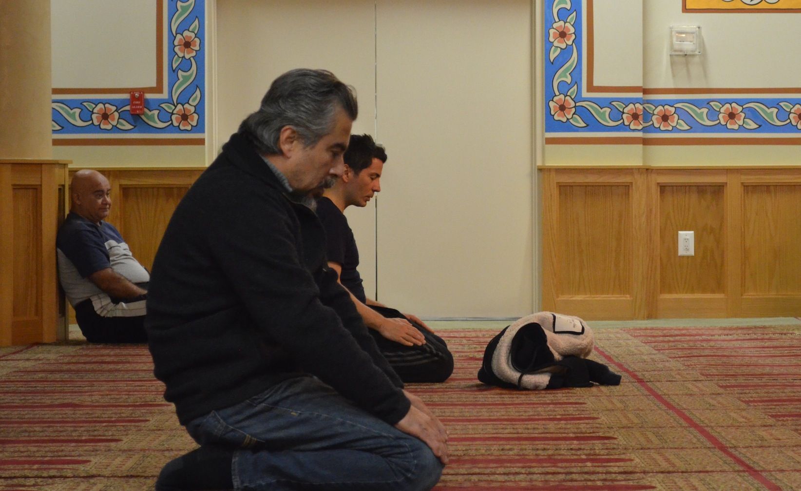 Kenan Taskent praying at the mosque.