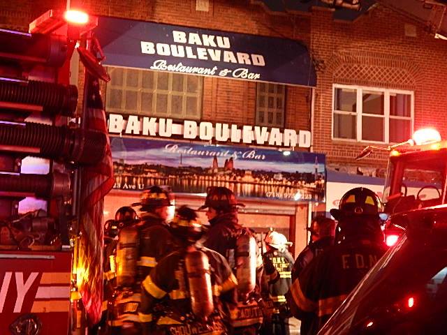 Firefighters outside the Baku Boulevard restaurant on Avenue U. (Photo: Mike Wright / Facebook)