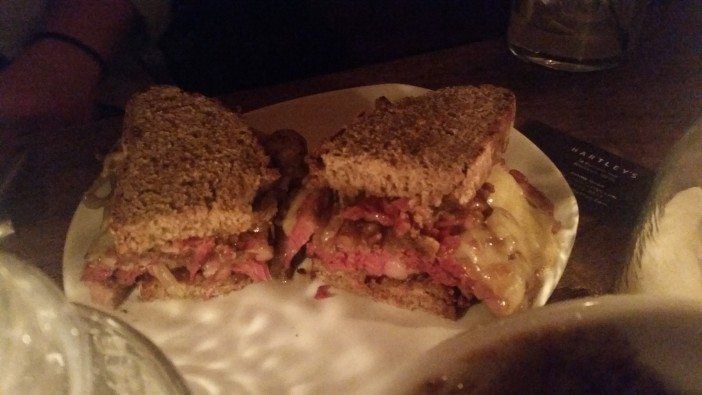 The spiced beef, Irish cheddar, and grilled onion sandwich on soda bread will have your mouth watering. (Photo by Heather Chin/Fort Greene Focus)