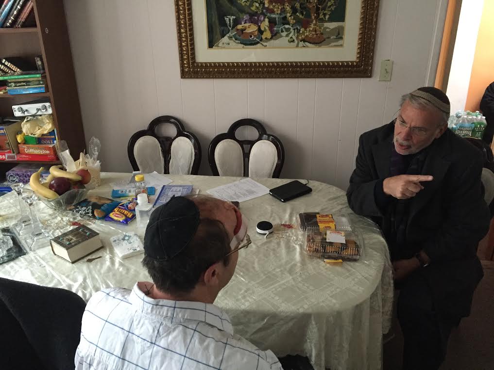 Assemblyman Dov Hikind meeting with Eli Weinstein after the attack. (Photo provided by Hikind's office)