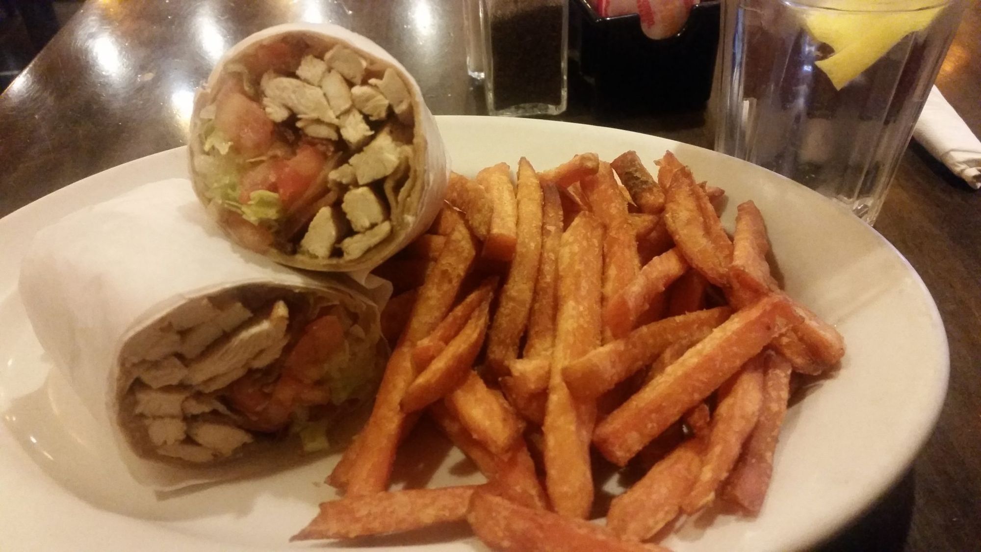 The Chicken BLT wrap comes with French Fries or a salad, but we paid extra for the sweet potato fries. (Photo by Heather Chin/Fort Greene Focus)