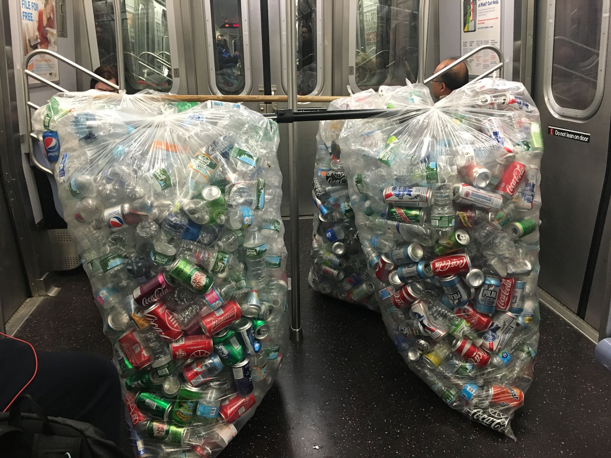 Straphangers Mystified By Massive Bottle Collections Blocking N Train Doors
