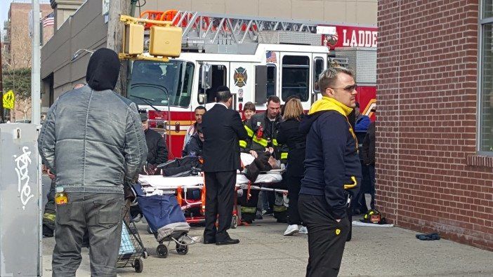 A man being taken away in a stretcher. (Photo: Stacey Kraus)