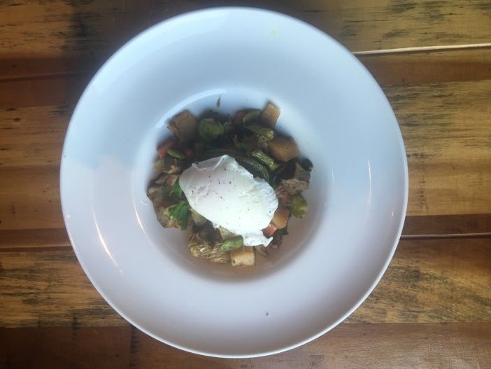 Braised beef hash with seasonal vegetables and a poached egg, $13.