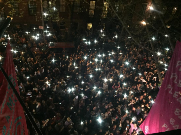 (Mourners waving their phones. Courtesy Spike Lee/Instagram.)