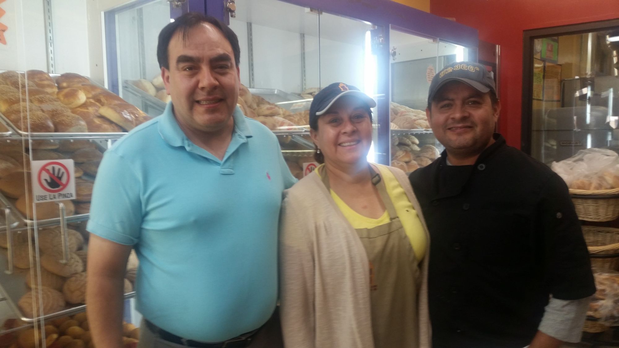 Miguel, Sara, and Armando Lopez are three of nine siblings who opened Don Paco Lopez Panaderia 25 years ago. (Photo by Heather Chin/Sunset Park Voice)