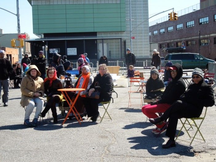 Sitting at the Avenue C cafe tables on a cold, windy Sunday afternoon.