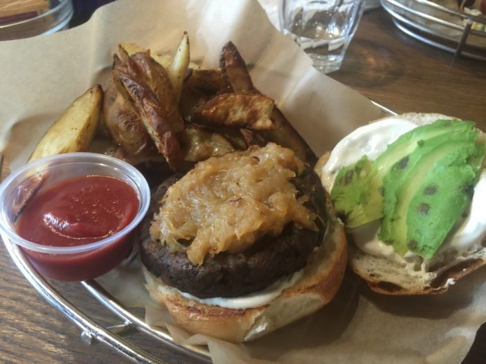 The California Burger with potato wedges.