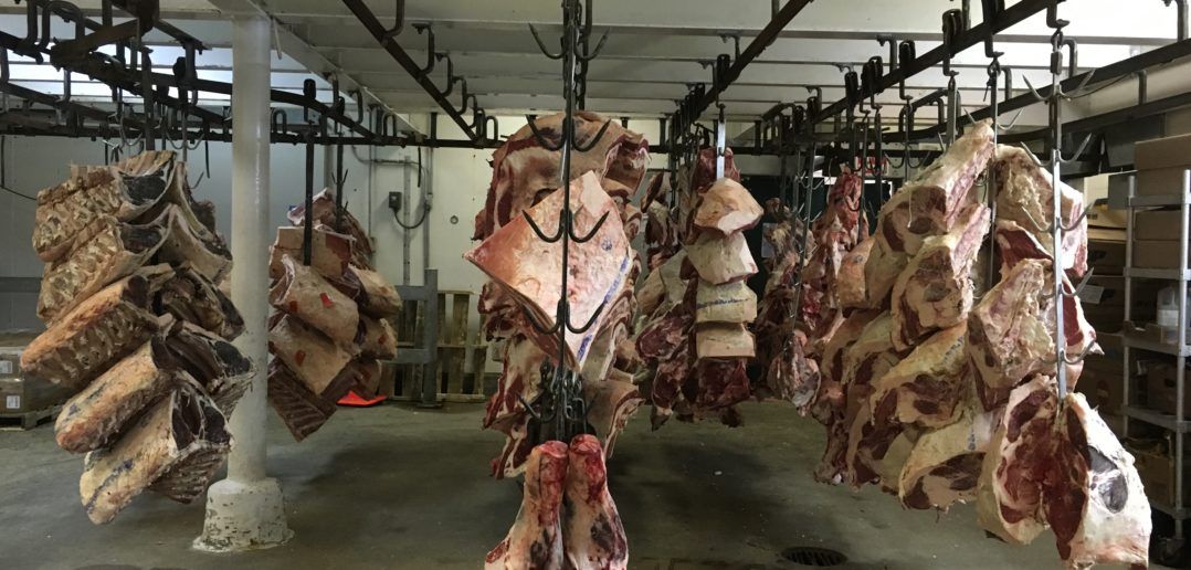 Meat hanging at King Solomon Foods