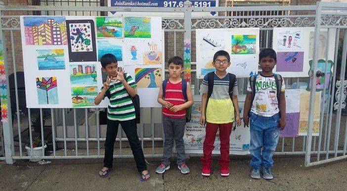 Bound For Success kids posing in front of their first public art project, McDonald Avenue (Photo by Moinul Alam)