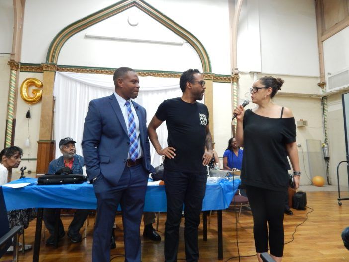 AFROPUNK's co-founders with Officer Brathwaite. (Courtesy Fort Greene Focus/Justin Fox)