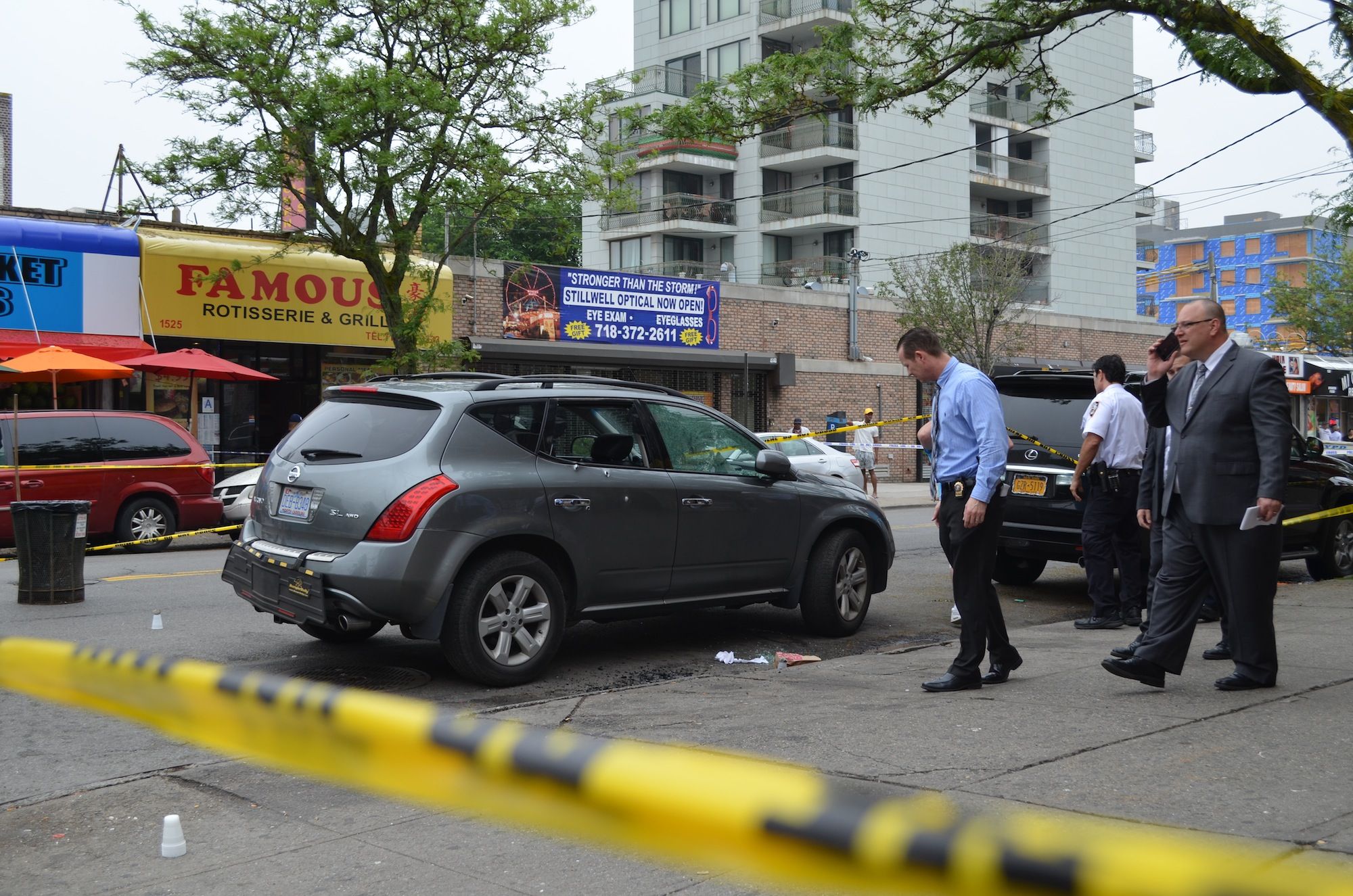 Police investigate a shooting at the corner of West 16th Street and Mermaid Avenue. (Photo: Alex Ellefson / Sheepshead Bites)