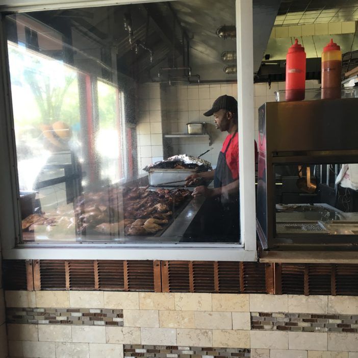 Grilling up some jerk chicken at Exquisite on Church Ave at Nostrand Ave. (Photo by Ditmas Park Corner)