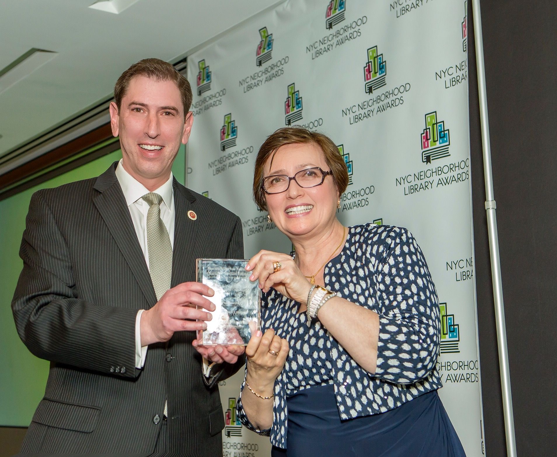 City Councilman Chaim Deutsch presenting the runner-up award to Kings Bay Library branch manager Liana Alaverdova. (Photo provided by Councilman Chaim Deutsch's office)