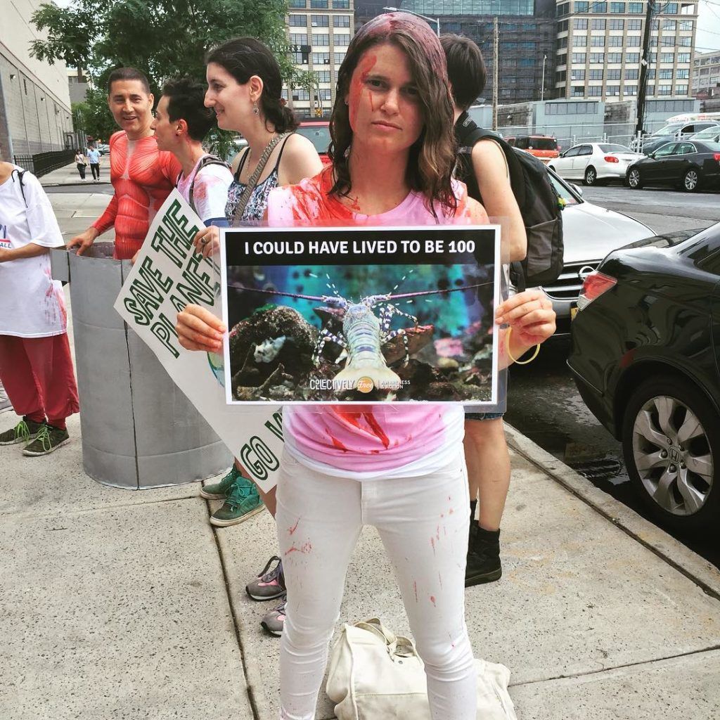 Activist Kelsey Bradley covered in fake blood to protest against lobster cruelty outside Industry City. (Courtsey: kelseynbradley / Instagram) 