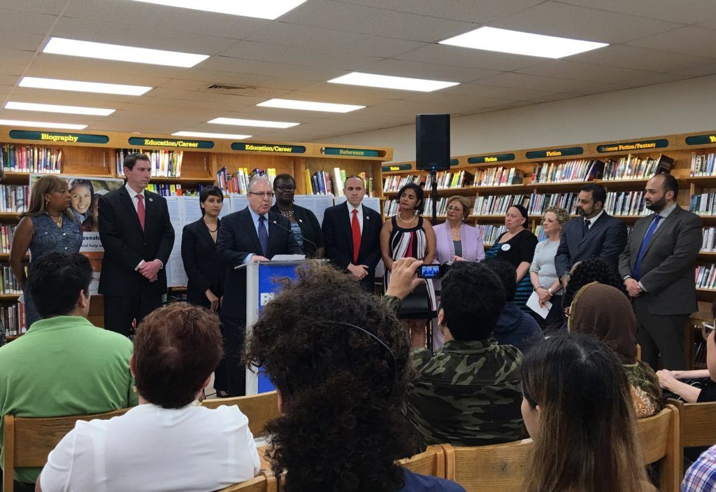 CIty announces voter registration forms in five new languages at Hillcrest Library in Brooklyn. (Courtesy: Mayor Bill de Blasio’s Office)