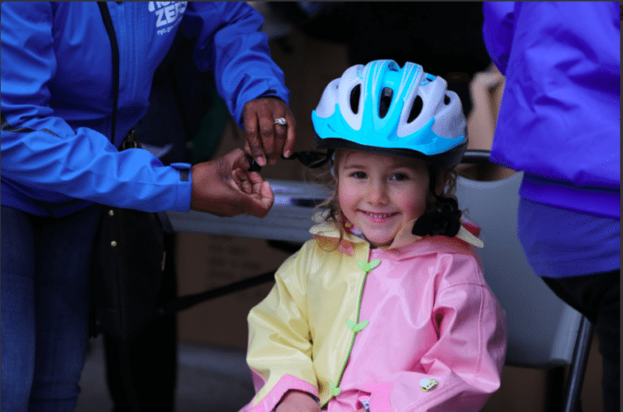 Smile! The DOT is giving away bike helmets! (Courtesy Twitter/NYCDOT)
