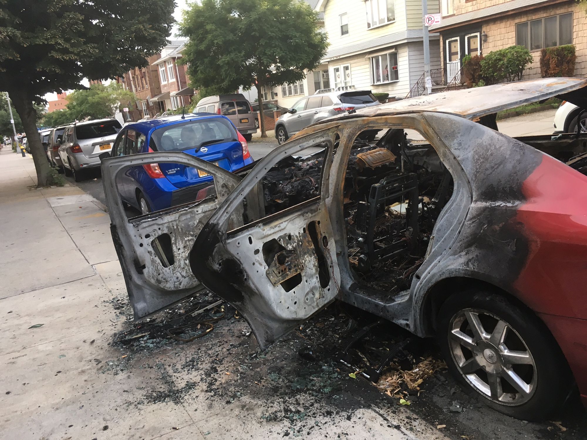 71st Street Mystery: Bombed Out Car Rots On Quiet Bensonhurst Block [Updated]