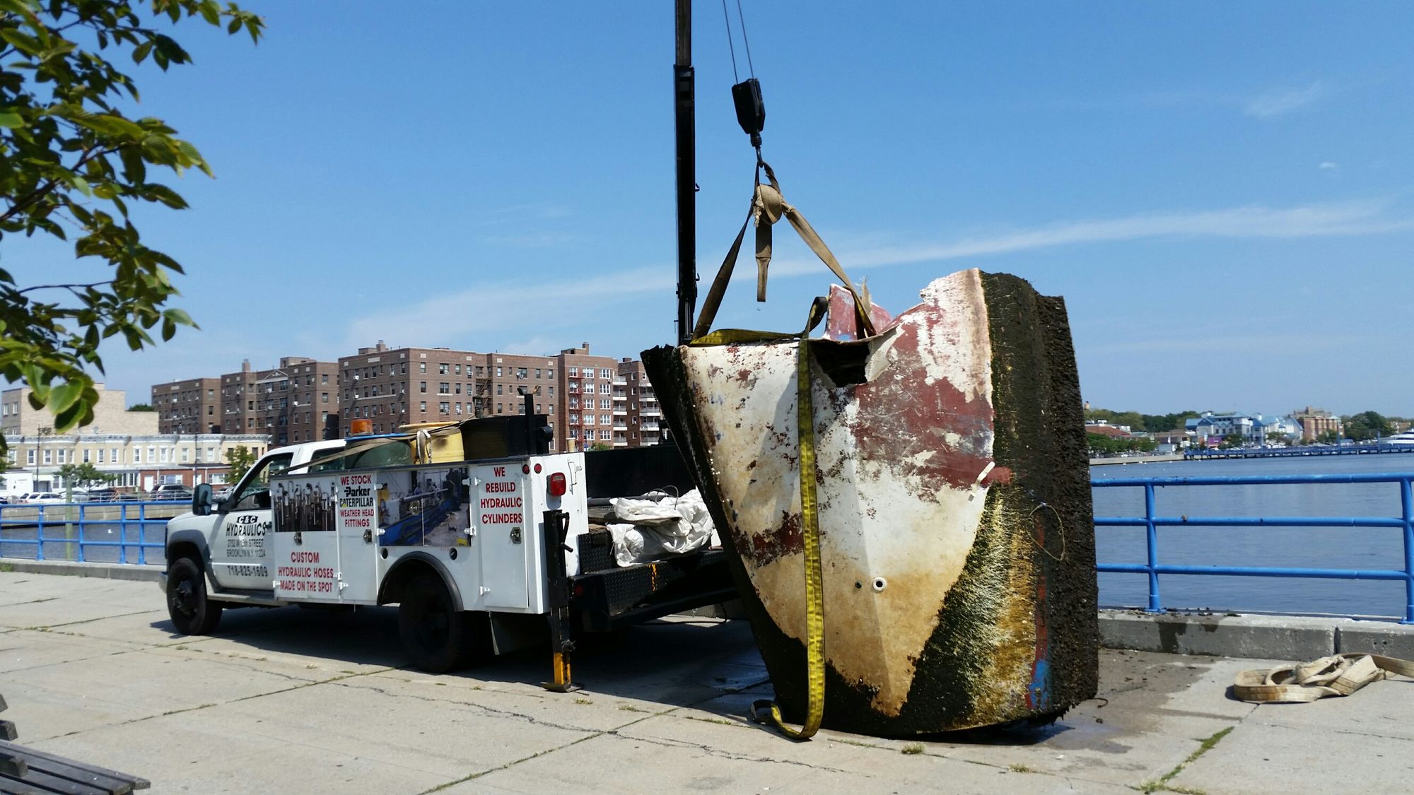 Rotting Overturned Boat In Bay Removed