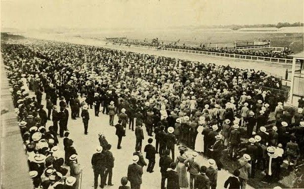 Spectators watch the Brooklyn Handicap at the Gravesend Race Track in 1904. Photo via Our BK Social