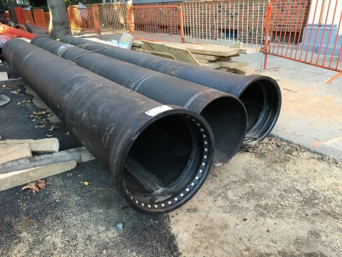 Ductile iron pipes lined up on Westminster Road. (Photo by Ditmas Park Corner)