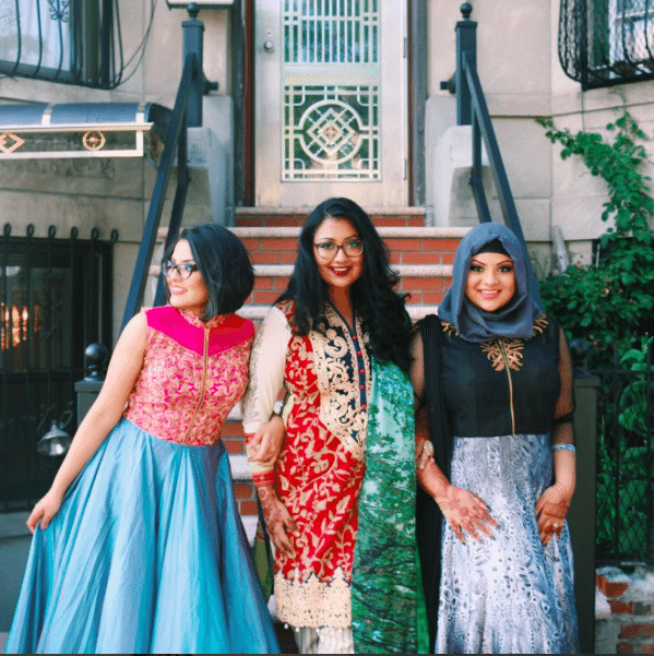 Shahana with her sisters, wearing the traditional salwar kameez 