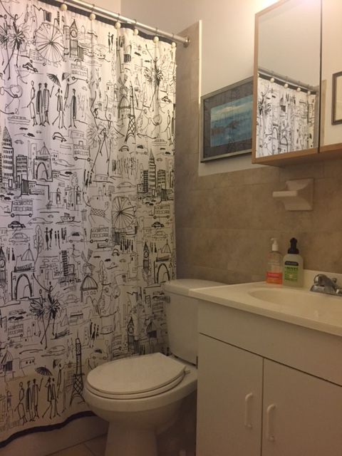 At first, I got excited that the drapes were Keith Haring. :/ (Courtesy Street Easy/Mike Cohen of A D Shaye Realty Group)