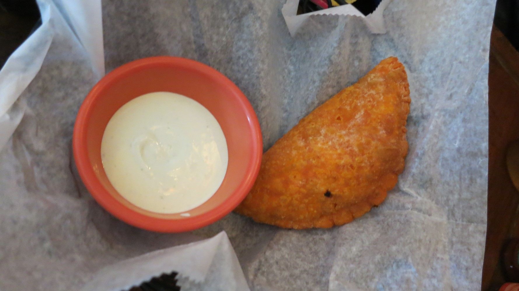 The shrimp empanada and sour cream. Photo by Hannah Frishberg