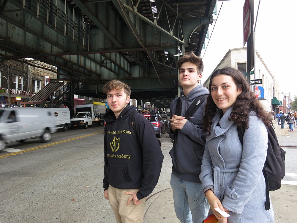 Jonathan, Veton, and Ksenia a block from their high school. Photo by Hannah Frishberg