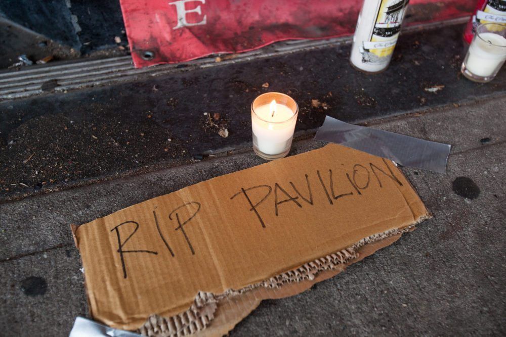 A make-shift vigil outside the theater. (Photo by Michelle McSwain)