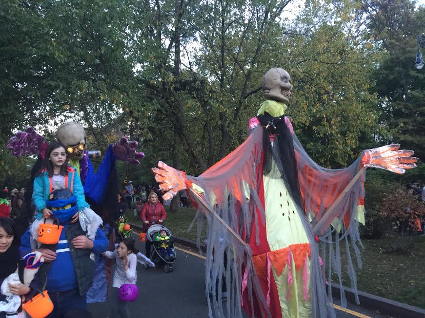 Dancing puppets march through the streets (Puppeteers Eva Lewandowski and Daniel brooks, Photo by Nathan Thompson)