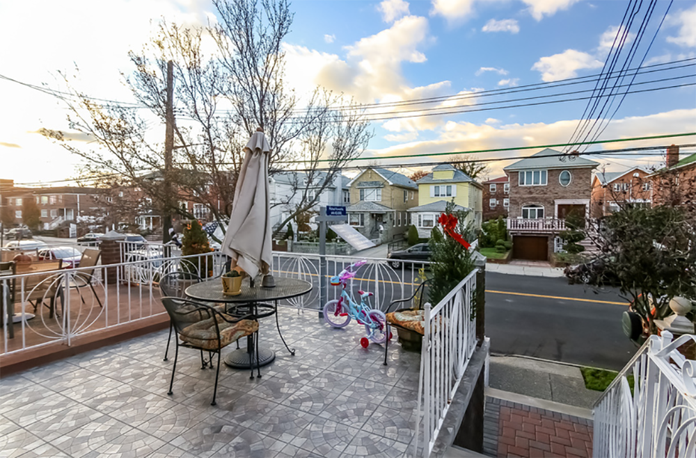 The home's front porch. (Photo via Warren Lewis Sotheby's International Realty)