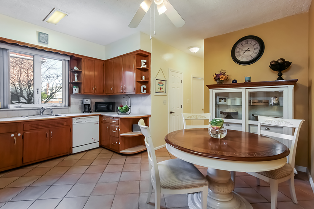 The home's living and dining room. (Photo via Warren Lewis Sotheby's International Realty)