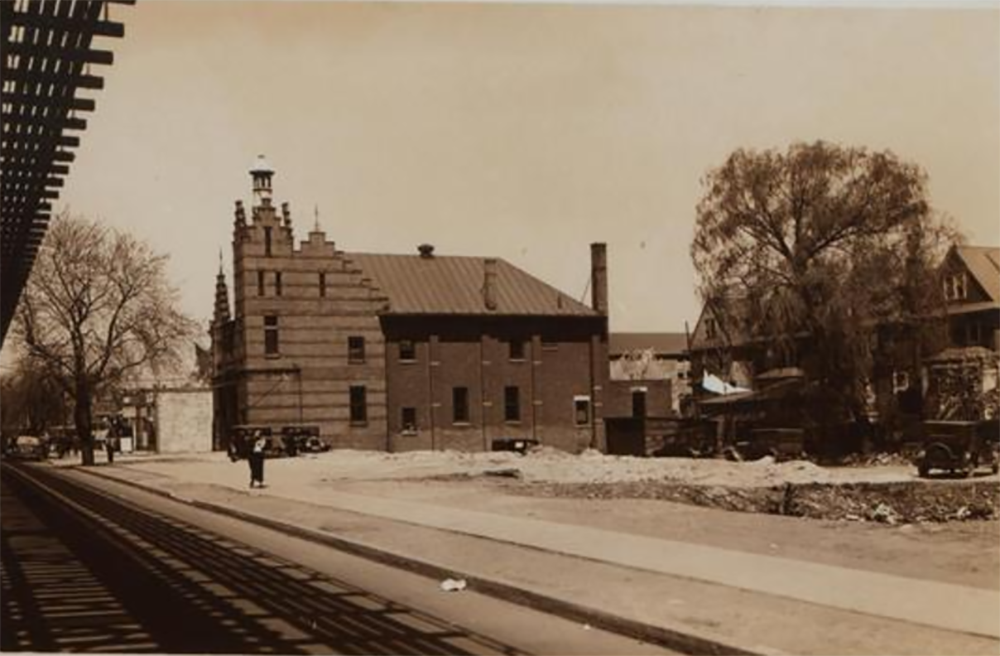 86th Street between 25th and 25th Avenues, with the elevated BMT line visible in the lefthand corner of the photo, 1935. (Photo via NYPL)