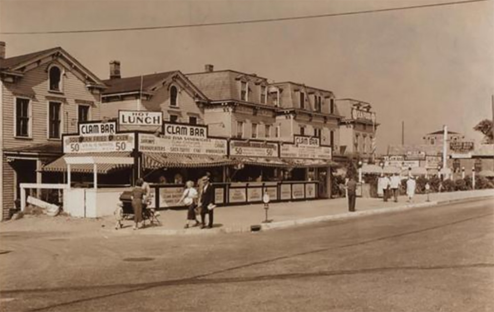 2253 to 2269 Emmons Avenue from Dooley Street to East 23rd Street, 1937. The view shows "how this tranquil residential area has changed into a commercial district."